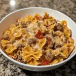 Creamy Beef Bowtie Pasta with Garlic Parmesan Sauce – Comfort in Every Bite