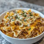 Cajun Garlic Butter Beef with Creamy Cheddar Bowtie Pasta