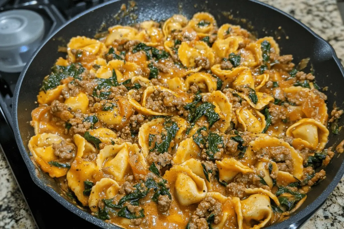 SPICY GARLIC BEEF & SPINACH TORTELLINI IN CREAMY CAJUN