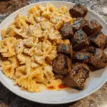 Cajun Steak Tips in Cheesy Parmesan Bowtie Pasta