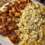 Cheesy Alfredo Bowtie Pasta with Cajun-Spiced Garlic Chicken