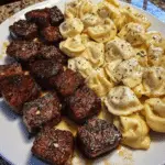 GARLIC BUTTER STEAK BITES & CREAMY ALFREDO TORTELLINI