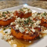 Gourmet Honey Feta Sweet Potato rounds topped with fresh herbs