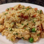 Delicious one-pan chicken and rice bake served with vegetables