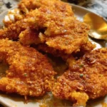 Deliciously crispy Cornflake-Crusted Chicken on a plate.
