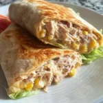 Tuna Melt Wrap with cheese and fresh ingredients served on a plate