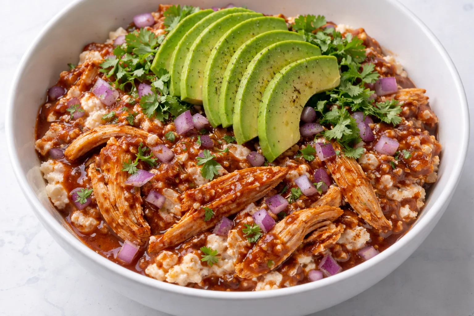 BBQ Chicken Cottage Cheese Bowl garnished with fresh herbs and vegetables