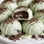 Mint Oreo Truffles topped with crushed Oreos and mint sprinkles