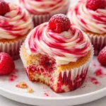 Red and White Swirled Frosted Cupcakes on a decorative platter