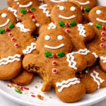 Soft and chewy gingerbread men cookies on a festive plate