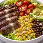 Delicious Southwest Grilled Steak Salad with fresh vegetables and grilled steak