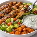 Ultimate grilled chicken bowl with sweet potatoes, avocado salsa, and herbed yogurt dip