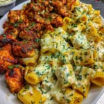 Creamy garlic butter chicken bites on a plate with herbs