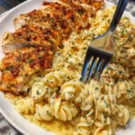 Creamy Garlic Chicken Rotini with Alfredo sauce for a flavorful dinner