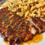 Creamy garlic parmesan chicken served with three-cheese penne pasta.