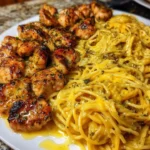 Creamy Lemon Garlic Butter Chicken Bites garnished with herbs