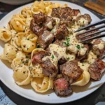 Delicious garlic butter steak bites served in Parmesan shells.