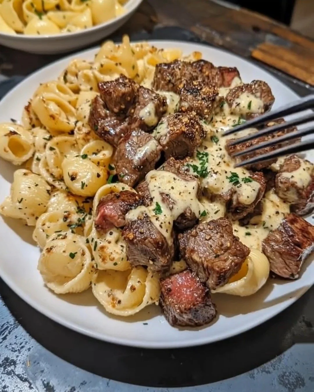 Delicious garlic butter steak bites served in Parmesan shells.