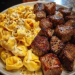 Delicious garlic butter steak bites served with tortellini for dinner