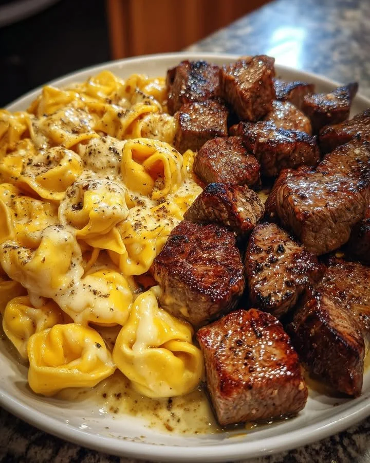Delicious garlic butter steak bites served with tortellini for dinner