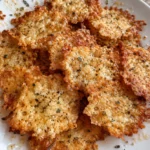 Plate of homemade cottage cheese crispy chips served as a healthy snack