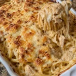 Delicious serving of easy Chicken Tetrazzini pasta bake with creamy sauce.