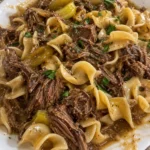 Slow Cooker Mississippi Beef and Noodles dish served in a bowl
